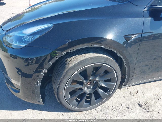 2023 Tesla Model Y Awd/long Range Dual Motor All-wheel Drive მანქანა იყიდება აუქციონზე, vin: 7SAYGDEE4PA118705, აუქციონის ნომერი: 45204506