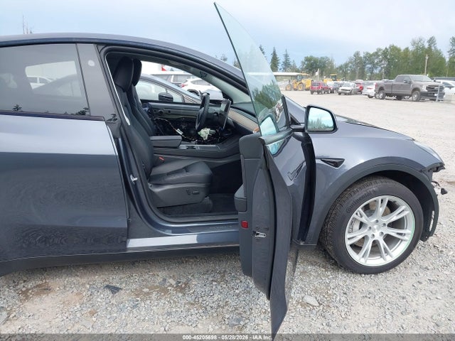 Auction sale of the 2023 Tesla Model Y Awd/long Range Dual Motor All-wheel Drive, vin: 7SAYGDEEXPA157041, lot number: 45205698