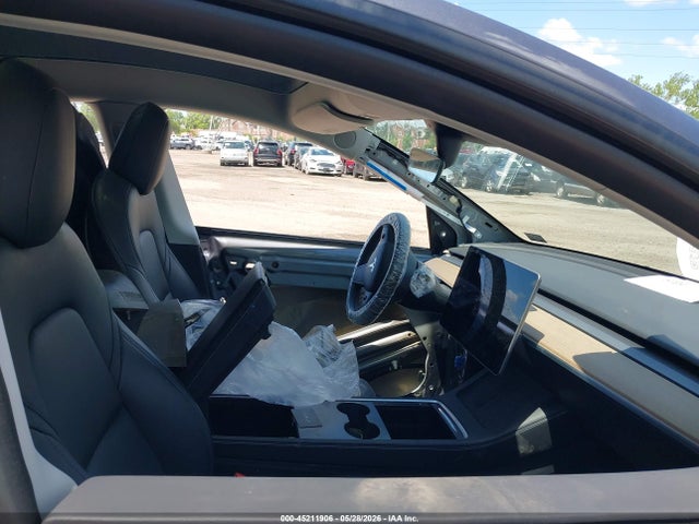 2022 Tesla Model Y Long Range Dual Motor All-wheel Drive მანქანა იყიდება აუქციონზე, vin: 7SAYGDEE6NF324155, აუქციონის ნომერი: 45211906