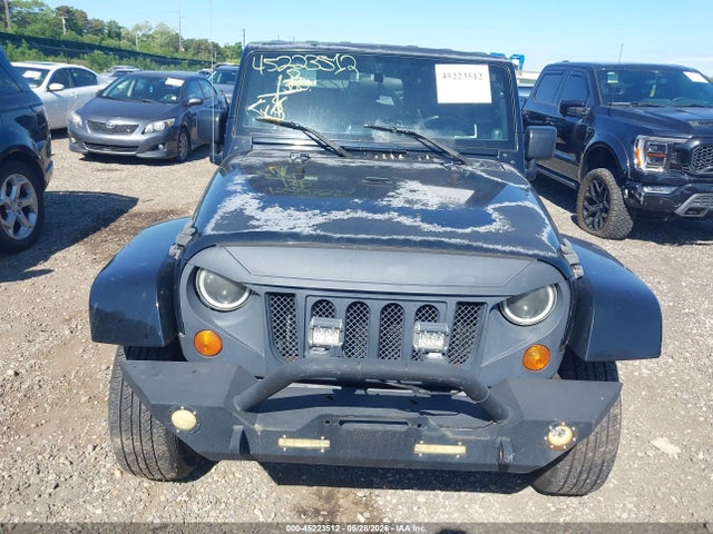 2007 Jeep Wrangler Unlimited Sahara მანქანა იყიდება აუქციონზე, vin: 1J8GA59197L163364, აუქციონის ნომერი: 45223512