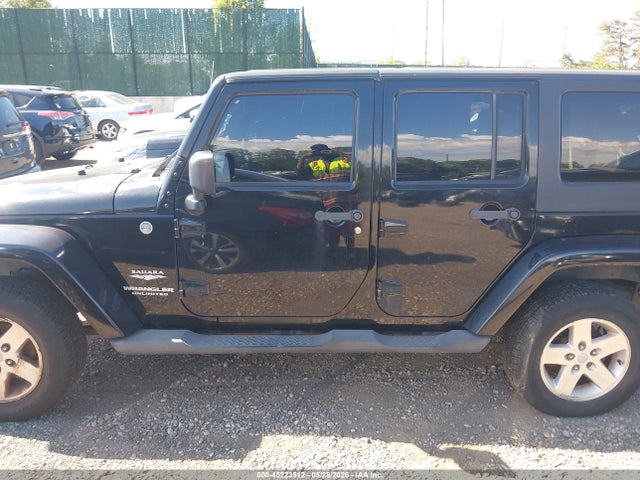 2007 Jeep Wrangler Unlimited Sahara მანქანა იყიდება აუქციონზე, vin: 1J8GA59197L163364, აუქციონის ნომერი: 45223512