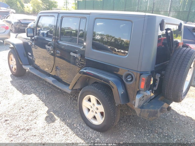 2007 Jeep Wrangler Unlimited Sahara მანქანა იყიდება აუქციონზე, vin: 1J8GA59197L163364, აუქციონის ნომერი: 45223512