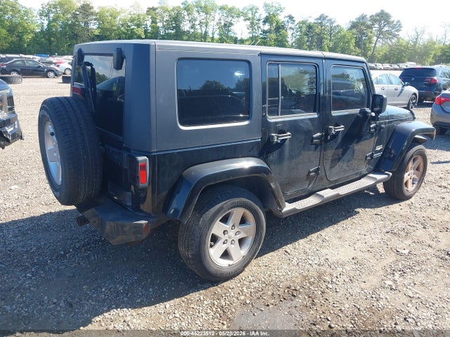 2007 Jeep Wrangler Unlimited Sahara მანქანა იყიდება აუქციონზე, vin: 1J8GA59197L163364, აუქციონის ნომერი: 45223512