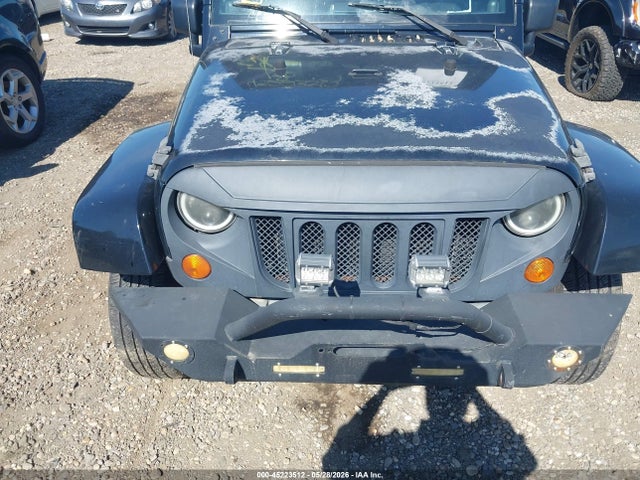 2007 Jeep Wrangler Unlimited Sahara მანქანა იყიდება აუქციონზე, vin: 1J8GA59197L163364, აუქციონის ნომერი: 45223512