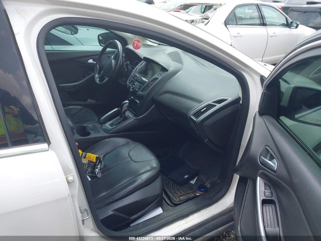 Продажа на аукционе авто 2013 Ford Focus Titanium, vin: 1FADP3N22DL144572, номер лота: 45224573