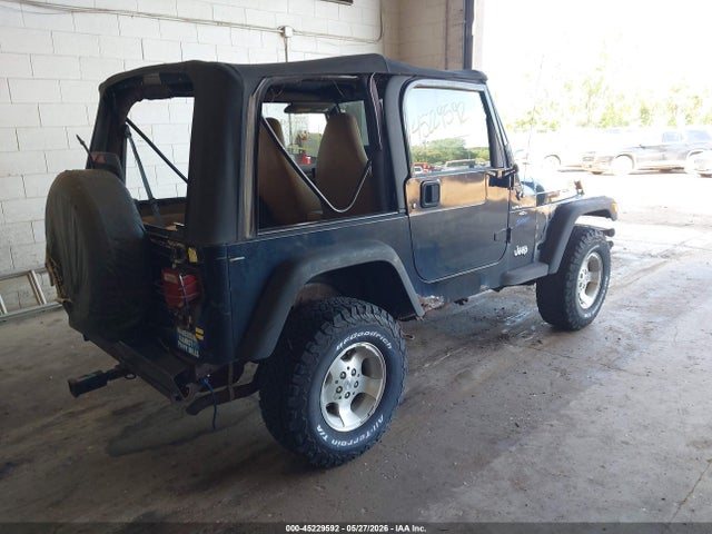 45229592 :رقم المزاد ، 1J4FY19S2VP518052 vin ، 1997 Jeep Wrangler Sport مزاد بيع