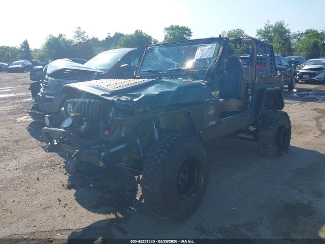 45231380 :رقم المزاد ، 1J4FA59S2YP790701 vin ، 2000 Jeep Wrangler Sahara مزاد بيع