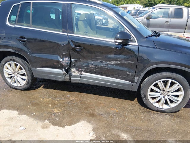 WVGBV3AX7EW549282 Volkswagen Tiguan Sel
