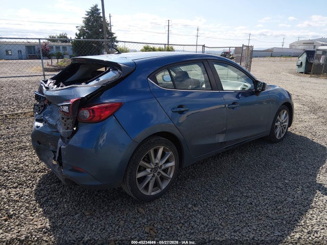 JM1BN1L77H1128640 Mazda Mazda3 Touring