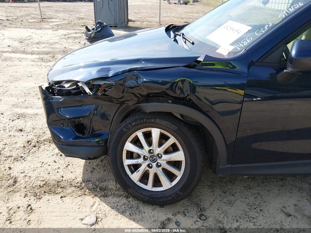 2015 Mazda Cx-5 Touring მანქანა იყიდება აუქციონზე, vin: JM3KE2CY9F0511486, აუქციონის ნომერი: 45258054