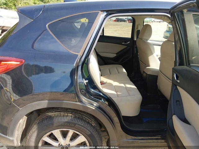 2015 Mazda Cx-5 Touring მანქანა იყიდება აუქციონზე, vin: JM3KE2CY9F0511486, აუქციონის ნომერი: 45258054