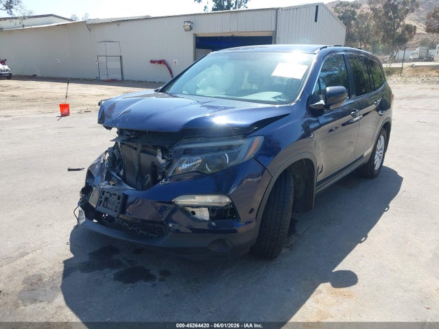 Honda PILOT LX 2018 5FNYF5H19JB026014 Image 2