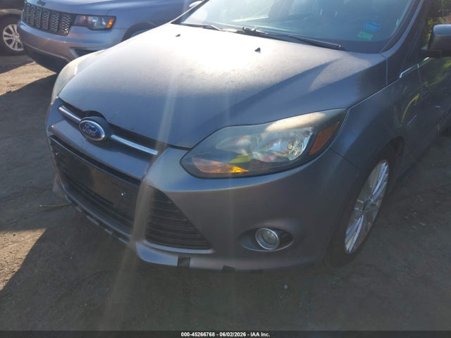 Продажа на аукционе авто 2014 Ford Focus Titanium, vin: 1FADP3N25EL319950, номер лота: 45266768