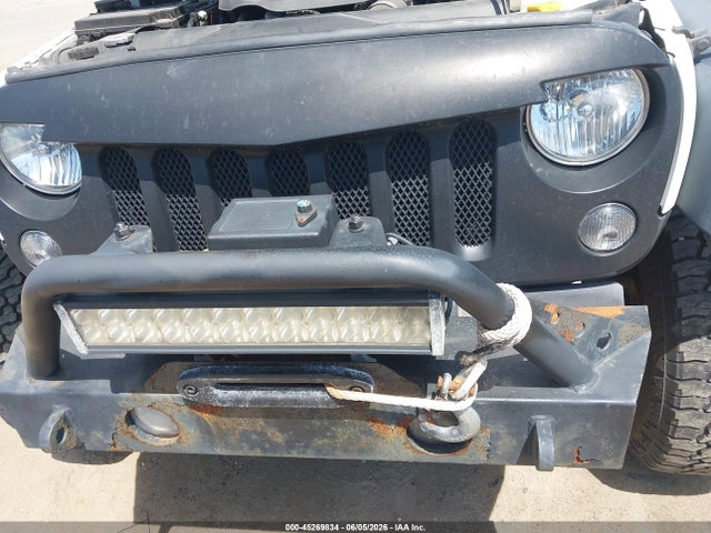 1C4BJWDG3EL306101 Jeep Wrangler Unlimited Sport