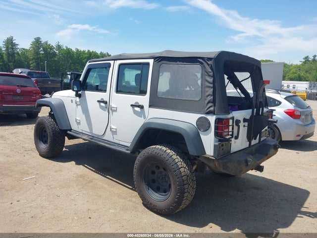 1C4BJWDG3EL306101 Jeep Wrangler Unlimited Sport