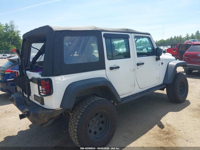 1C4BJWDG3EL306101 Jeep Wrangler Unlimited Sport