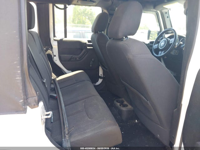 1C4BJWDG3EL306101 Jeep Wrangler Unlimited Sport