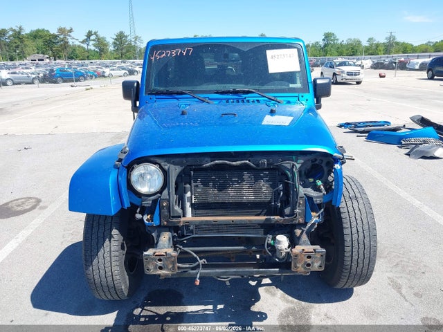 1C4BJWEG3FL555708 Jeep Wrangler Unlimited Sahara