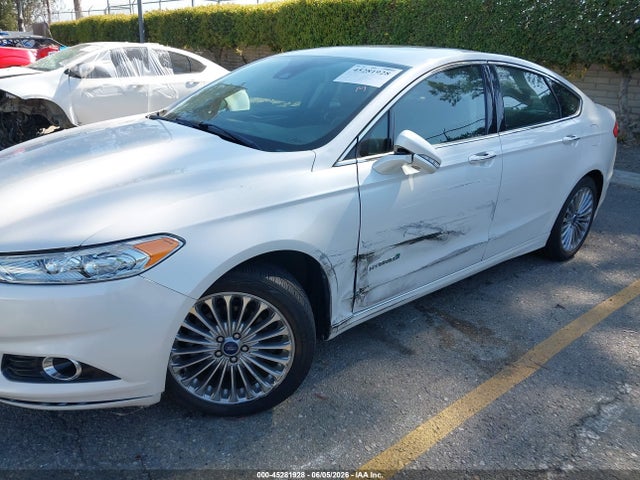 2014 Ford Fusion Hybrid Titanium მანქანა იყიდება აუქციონზე, vin: 3FA6P0RU8ER203534, აუქციონის ნომერი: 45281928