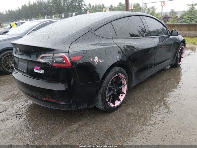 Tesla Model 3 Standard Range Plus Rear-wheel Drive 2021 5YJ3E1EA8MF906068 Image 4
