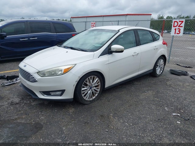 Продажа на аукционе авто 2016 Ford Focus Titanium, vin: 1FADP3N23GL307007, номер лота: 45292787