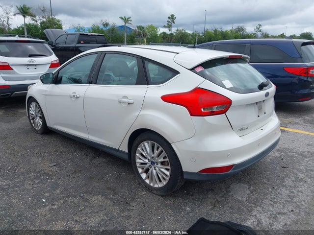 Продажа на аукционе авто 2016 Ford Focus Titanium, vin: 1FADP3N23GL307007, номер лота: 45292787
