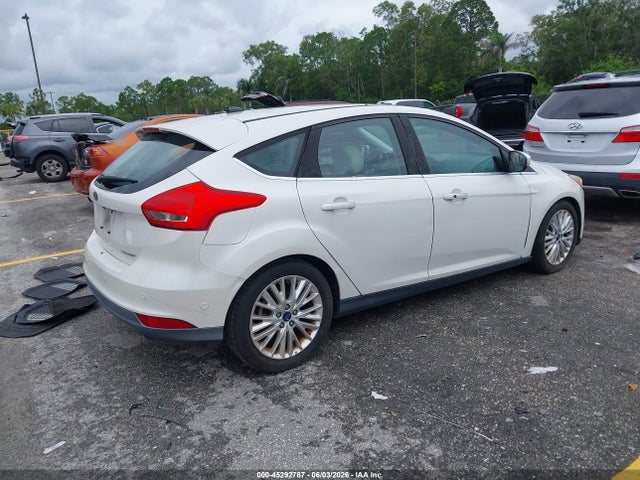 Продажа на аукционе авто 2016 Ford Focus Titanium, vin: 1FADP3N23GL307007, номер лота: 45292787