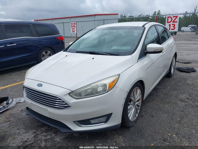 Продажа на аукционе авто 2016 Ford Focus Titanium, vin: 1FADP3N23GL307007, номер лота: 45292787