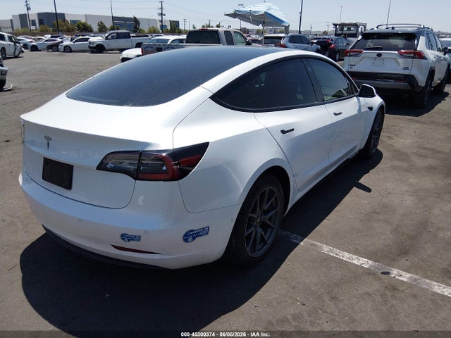 Tesla Model 3 Standard Range Plus Rear-wheel Drive 2021 5YJ3E1EA9MF996718 Image 4
