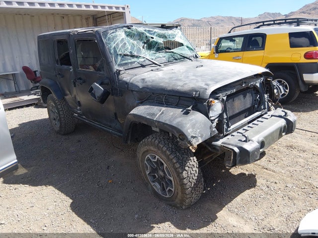 45303638 :رقم المزاد ، 1C4BJWDG2EL212601 vin ، 2014 Jeep Wrangler Unlimited Freedom Edition مزاد بيع