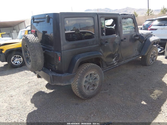 45303638 :رقم المزاد ، 1C4BJWDG2EL212601 vin ، 2014 Jeep Wrangler Unlimited Freedom Edition مزاد بيع