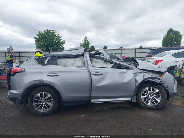 JTMRJREV1JD162145 Toyota Rav4 Hybrid Xle