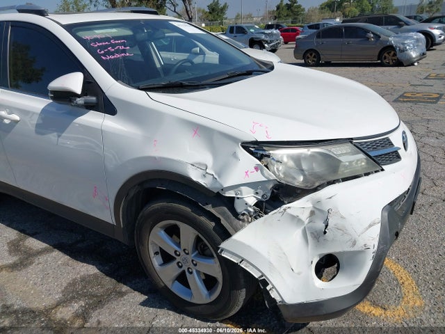 JTMWFREV4EJ013126 Toyota Rav4 Xle