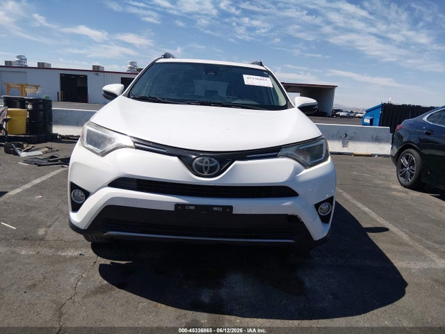 JTMRFREV2JJ252519 Toyota Rav4 Xle