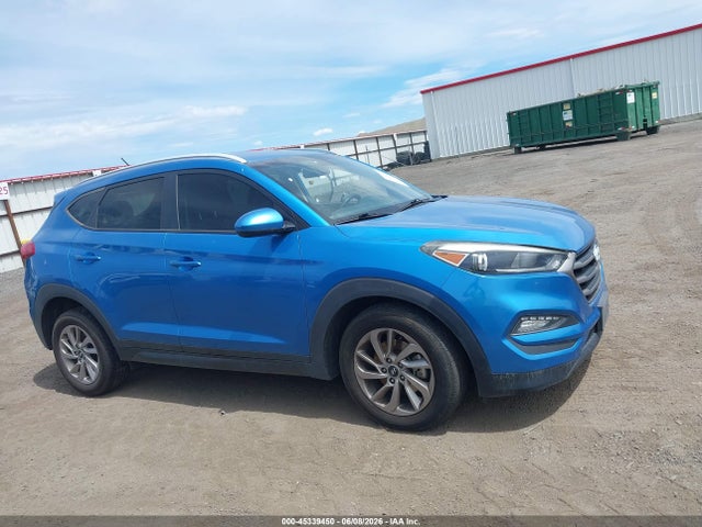 KM8J3CA45GU088282 Hyundai TUCSON SE