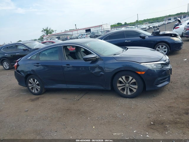 45343405 :رقم المزاد ، 2HGFC2F54JH535704 vin ، 2018 Honda Civic Lx مزاد بيع
