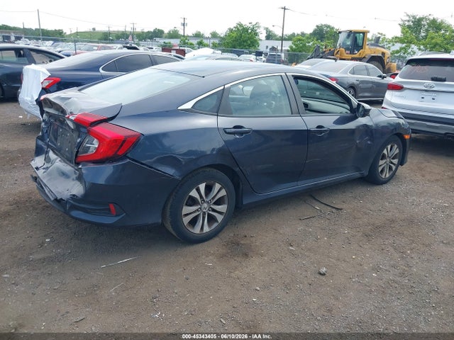 45343405 :رقم المزاد ، 2HGFC2F54JH535704 vin ، 2018 Honda Civic Lx مزاد بيع