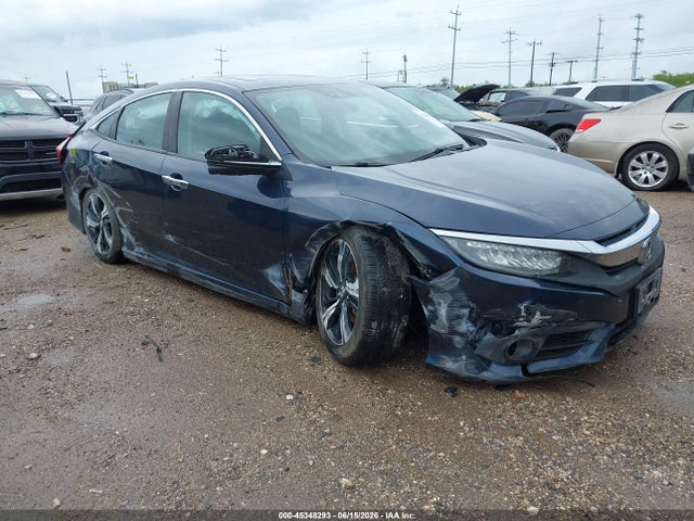 Honda Civic Touring 2016 19XFC1F97GE034385 Image 1