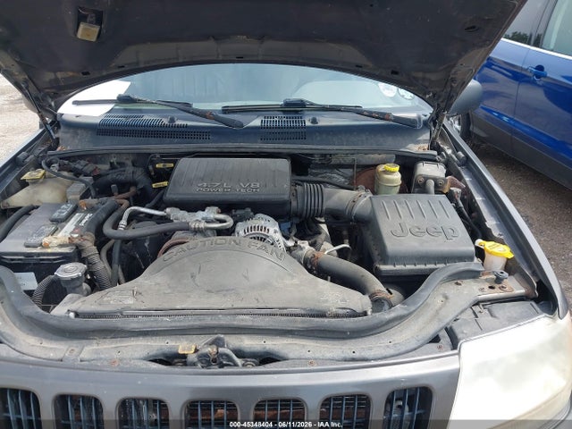 45348404 :رقم المزاد ، 1J4GW68N9XC642915 vin ، 1999 Jeep Grand Cherokee Limited مزاد بيع