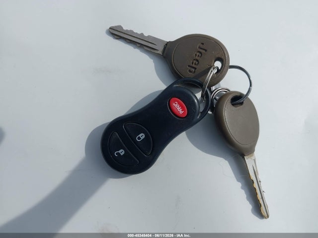 45348404 :رقم المزاد ، 1J4GW68N9XC642915 vin ، 1999 Jeep Grand Cherokee Limited مزاد بيع