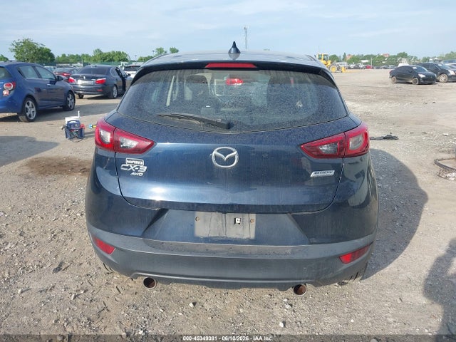JM1DKFC70K0449687 Mazda Cx-3 Touring