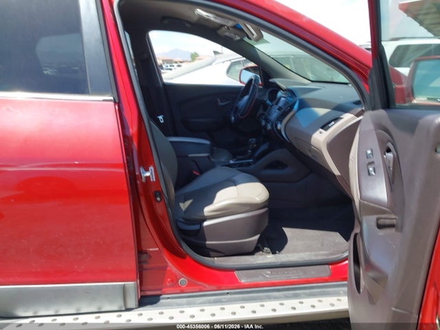 KM8JU3AG0EU873541 Hyundai TUCSON SE