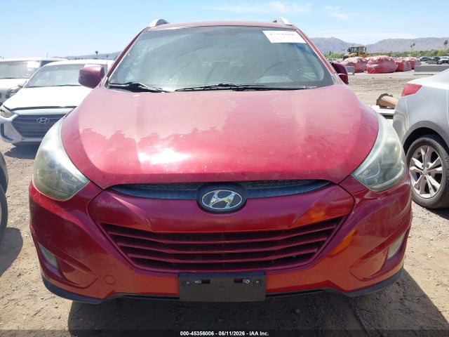 KM8JU3AG0EU873541 Hyundai TUCSON SE