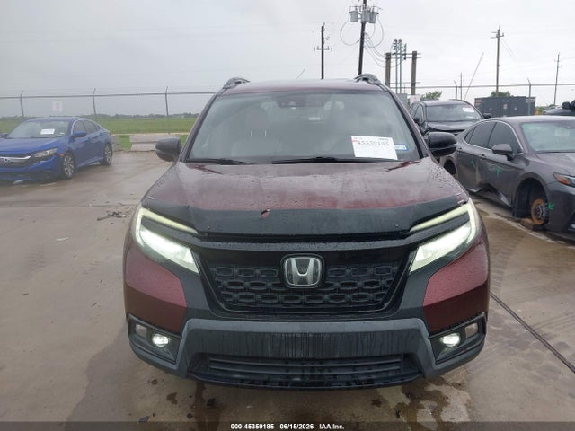 5FNYF8H06KB008077 Honda Passport Elite