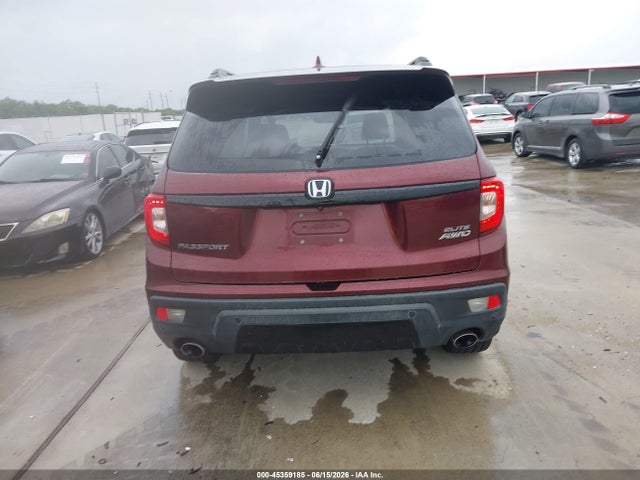 5FNYF8H06KB008077 Honda Passport Elite