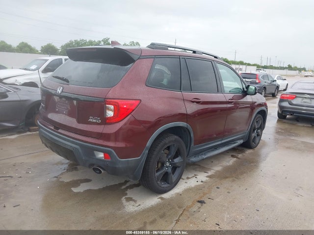 5FNYF8H06KB008077 Honda Passport Elite