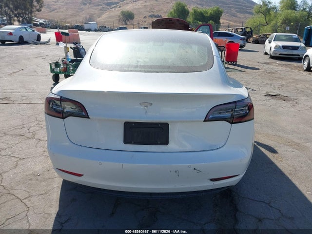 2021 Tesla Model 3 Standard Range Plus Rear-wheel Drive მანქანა იყიდება აუქციონზე, vin: 5YJ3E1EA5MF051717, აუქციონის ნომერი: 45360467