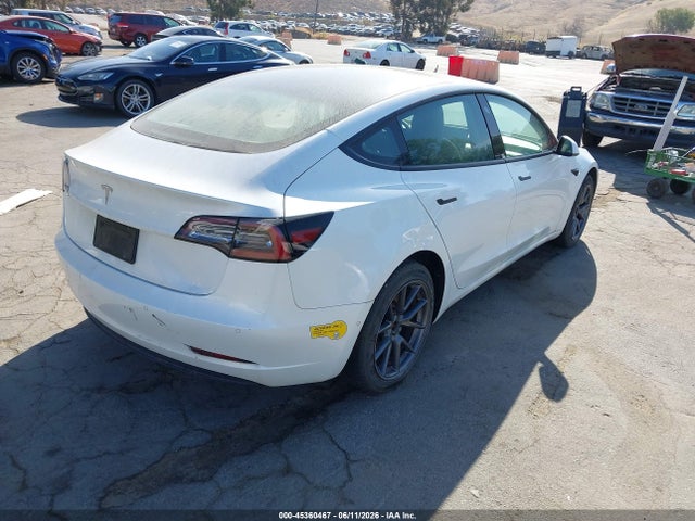 2021 Tesla Model 3 Standard Range Plus Rear-wheel Drive მანქანა იყიდება აუქციონზე, vin: 5YJ3E1EA5MF051717, აუქციონის ნომერი: 45360467