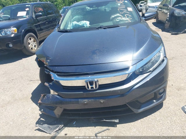 45371126 :رقم المزاد ، 19XFC1F9XGE014373 vin ، 2016 Honda Civic Touring مزاد بيع