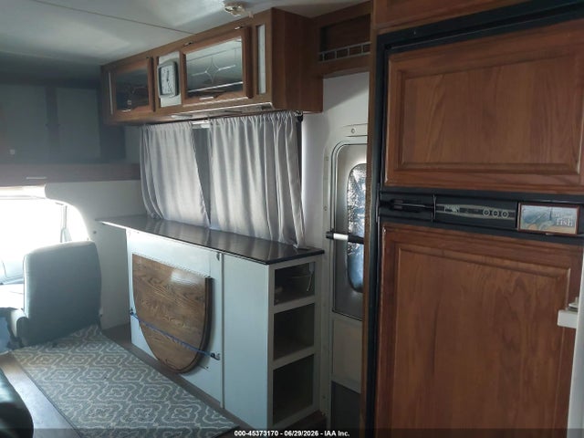 1999 Ford Econoline E450 Super Duty Cutwy  Rv მანქანა იყიდება აუქციონზე, vin: 1FDXE40S5XHA74806, აუქციონის ნომერი: 45373170